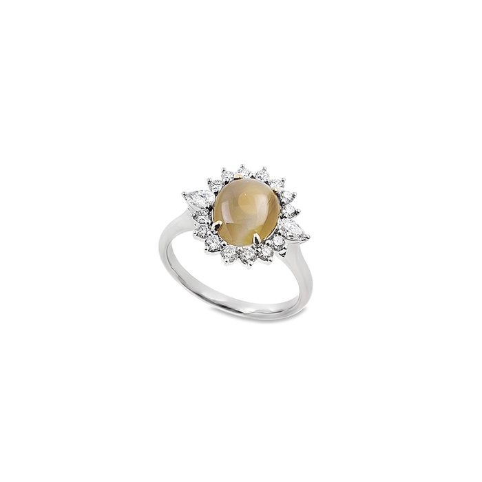 A white gold oval cat eye ring with floral diamond halo against a white background