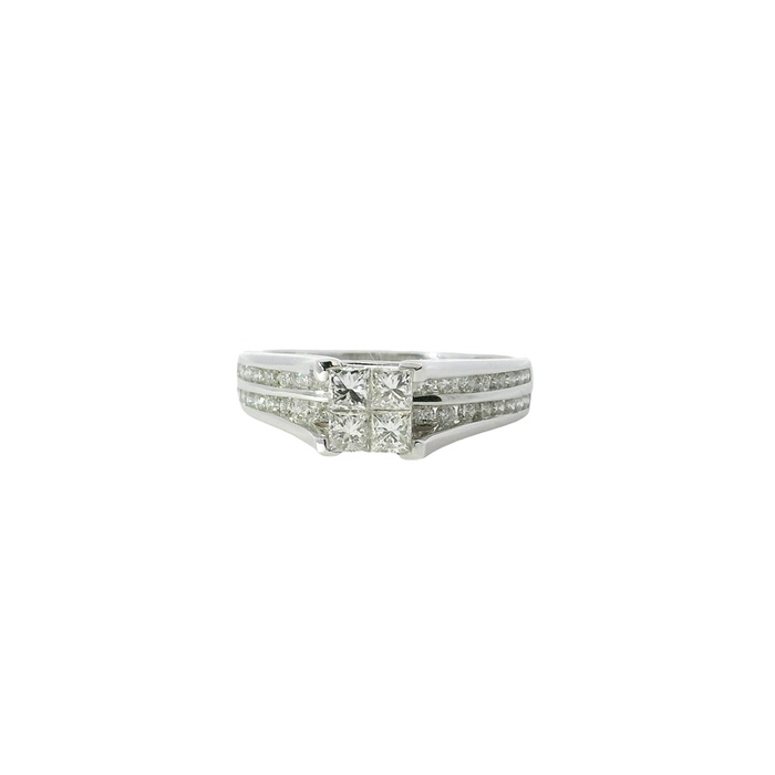 A silver ring with a square diamond cluster at the center, flanked by two rows of smaller diamonds on the band.