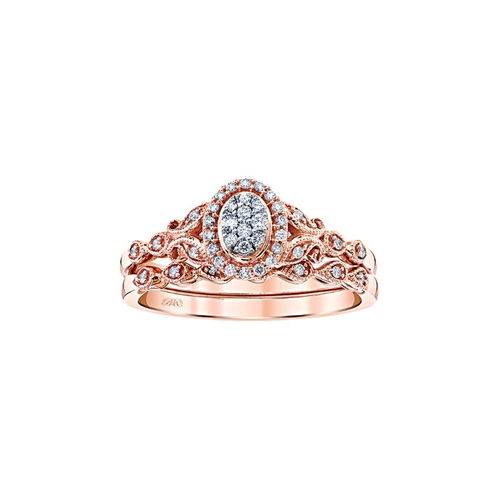 A rose gold bridal set with oval diamond at the center.