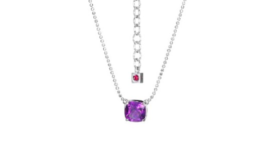 a white gold pendant necklace featuring an amethyst