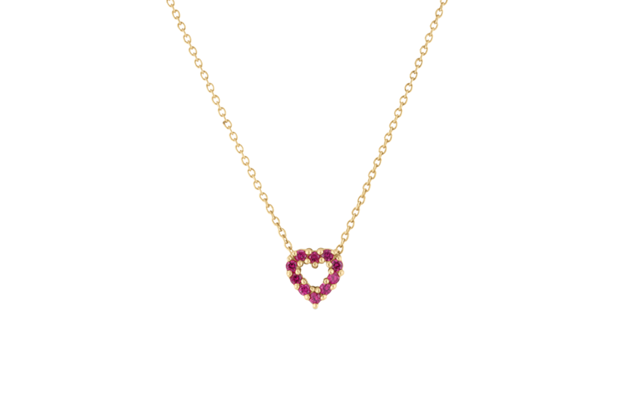 A yellow gold heart necklace with rubies making up the heart shape.