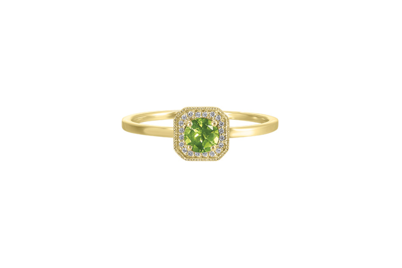 A yellow gold diamond ring with a peridot center stone and a diamond halo.