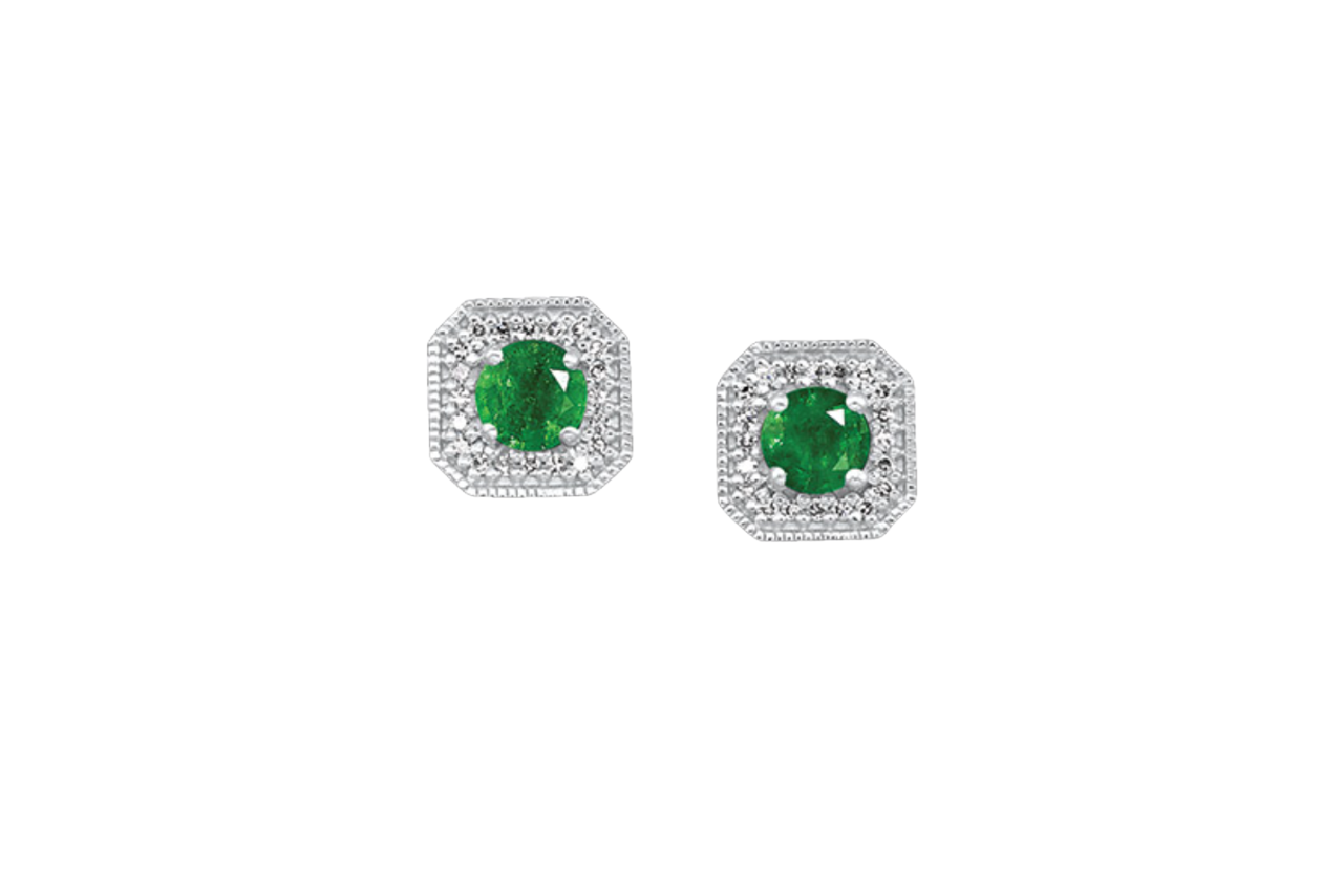 A pair of white gold emerald and diamond stud earrings.