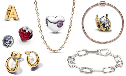 A close-up of 4 pieces of jewelry and multiple charms by Pandora, all available at Albert’s Diamond Jewelers.