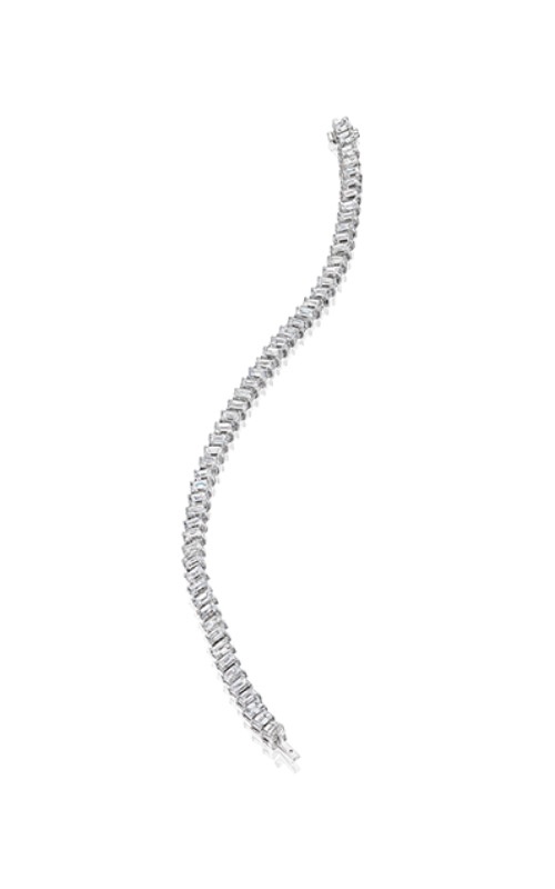 An emerald cut white gold diamond tennis bracelet. 