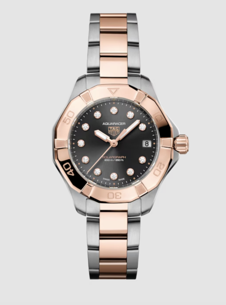 A mixed metal stainless steel wristwatch with black dial