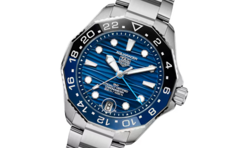 A close-up of a stainless steel TAG Heuer Aquaracer watch, available at Albert&rsquo;s Diamond Jewelers.