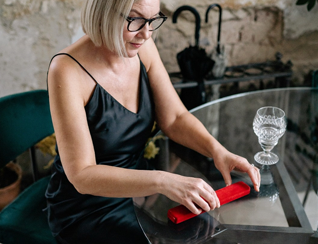 woman opening jewelry box