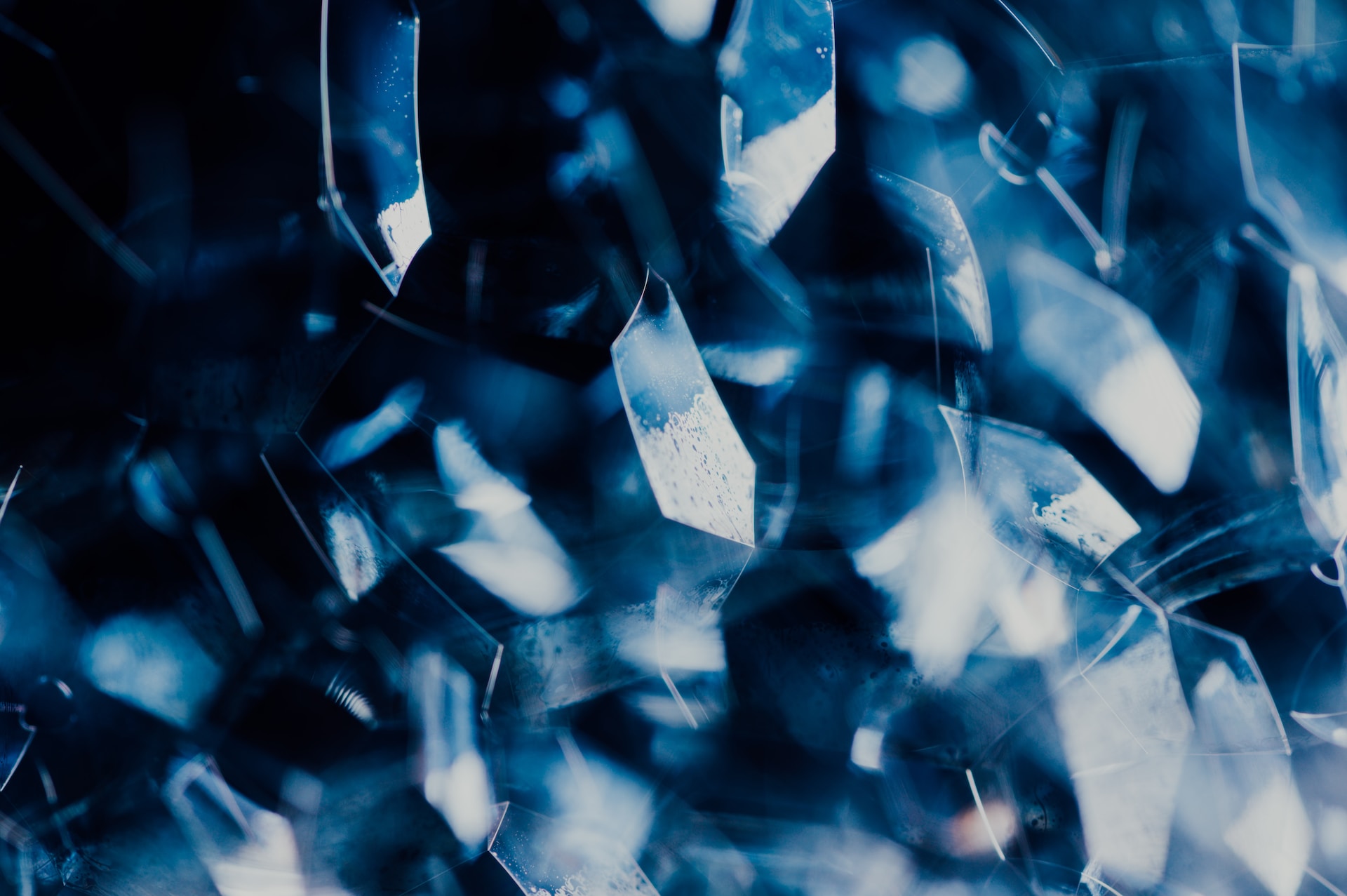 A close-up of a blue stone’s reflective surface.